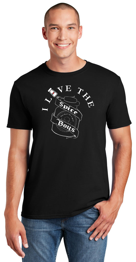 A smiling man wears the Spice Boys Love Jar - Gildan Softstyle T-Shirt (64000), a black, modern classic fit tee made from ring spun US cotton, with white "I love the spice boys" text, a spice jar icon as the "o," and a bold banner graphic in the center.