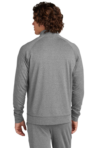 A person with curly brown hair is shown from the back, wearing a light gray Creative Kids Learning Center - CKLC Sport-Tek Sport-Wick Stretch Full-Zip Cadet Jacket ST857 and matching pants against a plain white background.